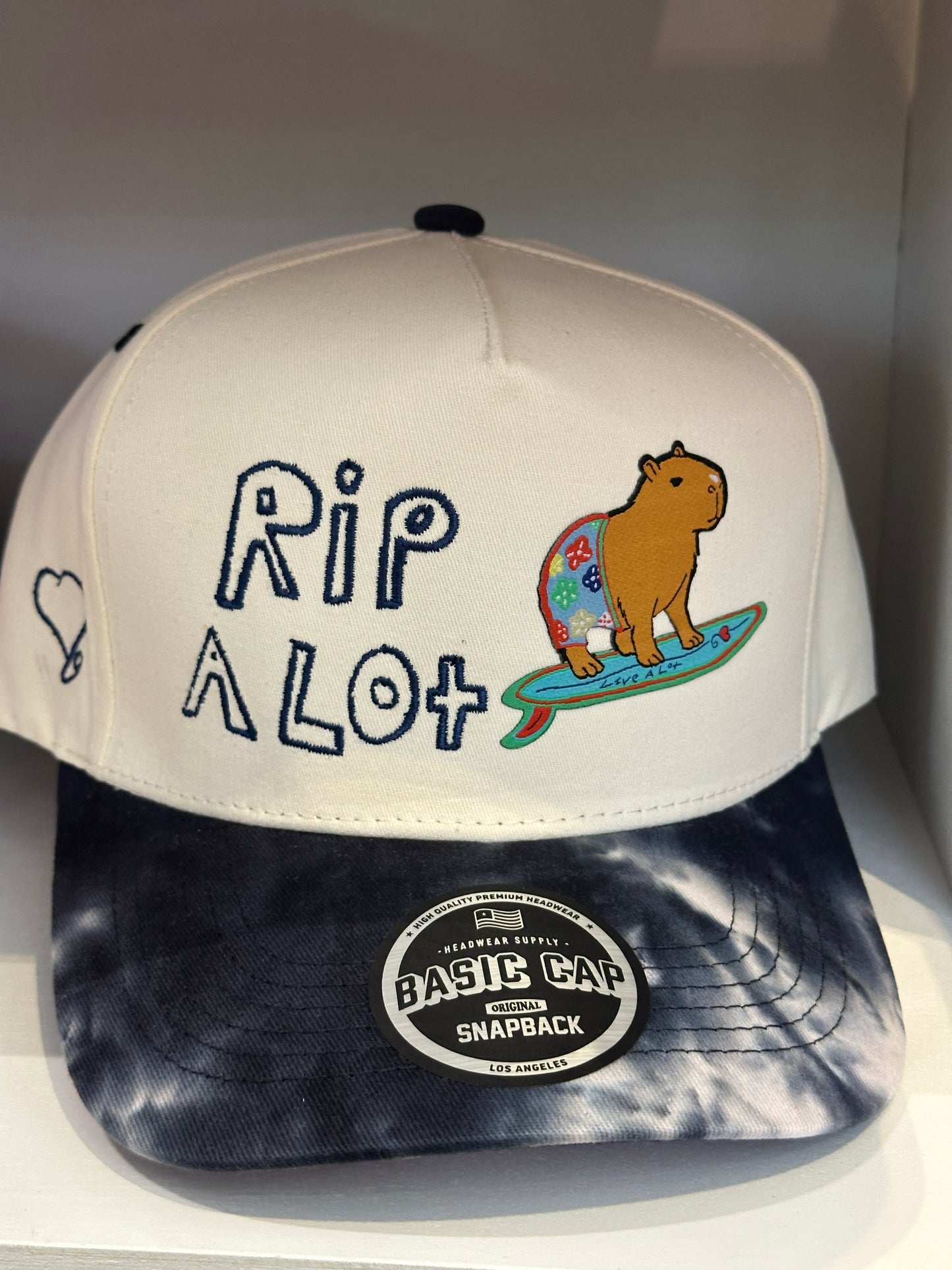 Surfing Capybara Snapback -   RIP A LOT™